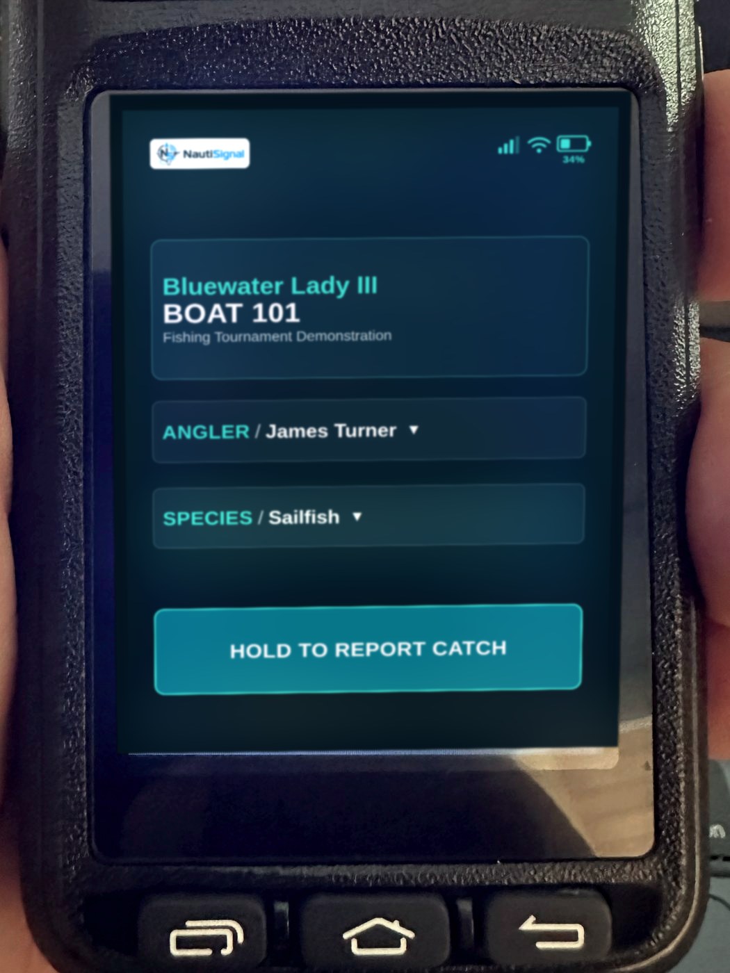 The handheld in a captain's hand, boat, angler and species loaded, ready to hold and report the catch